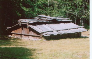 Figure 4. Yurok-style plank house similar to those built by north coastal tribes through the 19th century. This particular plank house is from the Sumêg Village, located inside Patrick’s Point State Park, California. Source: Coquille Indian Tribe